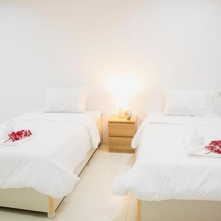 ตะวันแมนชั่น Appartement Ban Na Khua Buitenkant foto