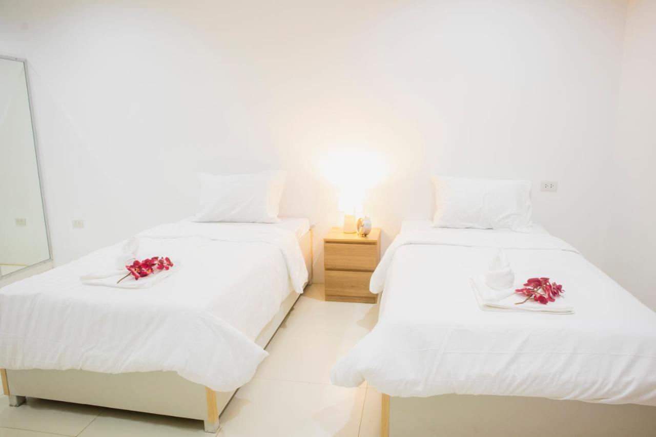 ตะวันแมนชั่น Appartement Ban Na Khua Buitenkant foto